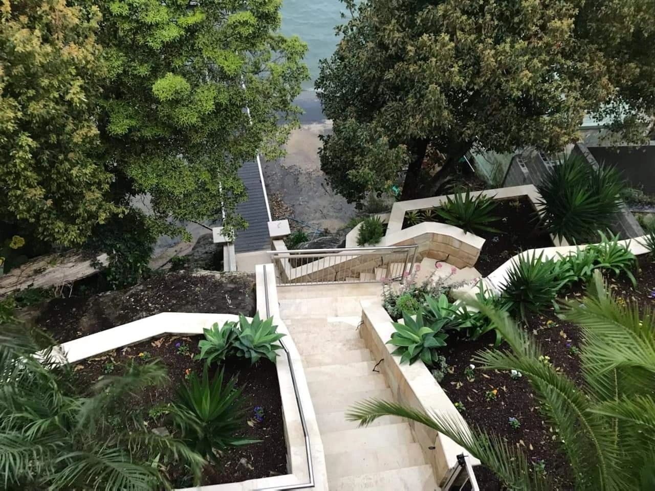 Waterfront garden with tiered landscaping